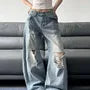 Low Rise Washed Distressed Wide Leg Jeans