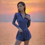 Set: Long-Sleeve Half-Zip Striped Swimsuit + Swim Shorts