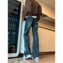 Mid Rise Washed Distressed Flared Jeans