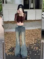 Mid Rise Frayed Flared Jeans