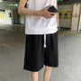 Mid Rise Washed Denim Shorts