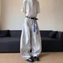 Mid Rise Plaid Panel Washed Wide Leg Jeans