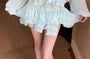 Long-Sleeve V-Neck Plain Ruffle Trim Tie Front Sheer Crop Blouse / Low Rise Rhinestone Accent Layered Mini A-Line Skirt