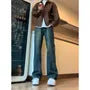 Mid Rise Washed Distressed Flared Jeans