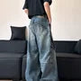Mid Rise Paneled Washed Wide Leg Cargo Jeans