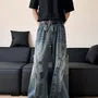 Mid Rise Paneled Washed Wide Leg Cargo Jeans