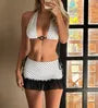 Set: Halter Neck Polka Dot Bikini Top + Low Waist Ruffled Hem Mini Skirt
