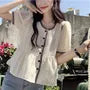 Short Sleeve Crew Neck Dotted Peplum Blouse