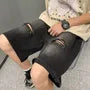 Mid Rise Washed Distressed Jorts