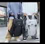 Plain Label Applique Buckled Flap Backpack