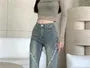 Mid Rise Washed Distressed Flared Jeans