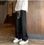 Drawstring-Waist Button-Hem Harem Pants