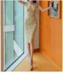 Sleeveless V-Neck Lace Sheath Dress