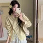 Long-Sleeve V-Neck Collared Lace Trim Buttoned Side-Tie Puff Sleeve Blouse