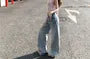 Knot Asymmetrical Lace Cropped Halter Top / Low Rise Washed Wide Leg Jeans