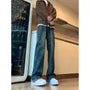 Mid Rise Washed Distressed Flared Jeans