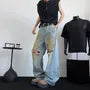 Mid Rise Distressed Washed Wide Leg Jeans